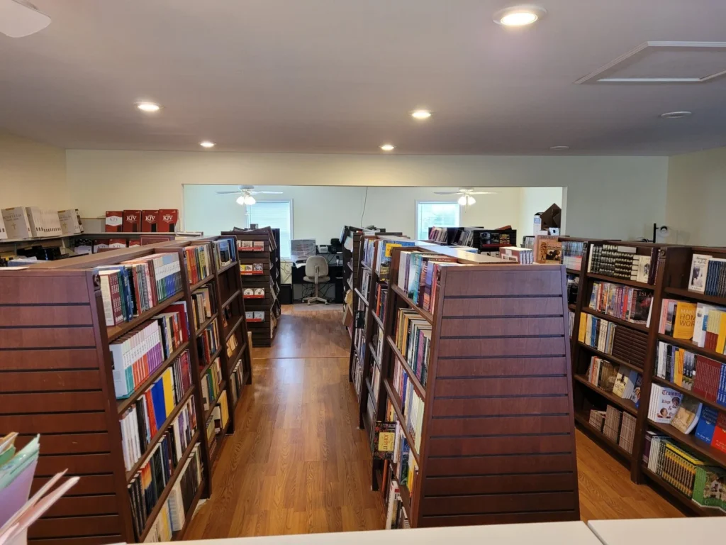 Inside the Fundamental Baptist Books used bookstore, shelves filled with pastors' library books